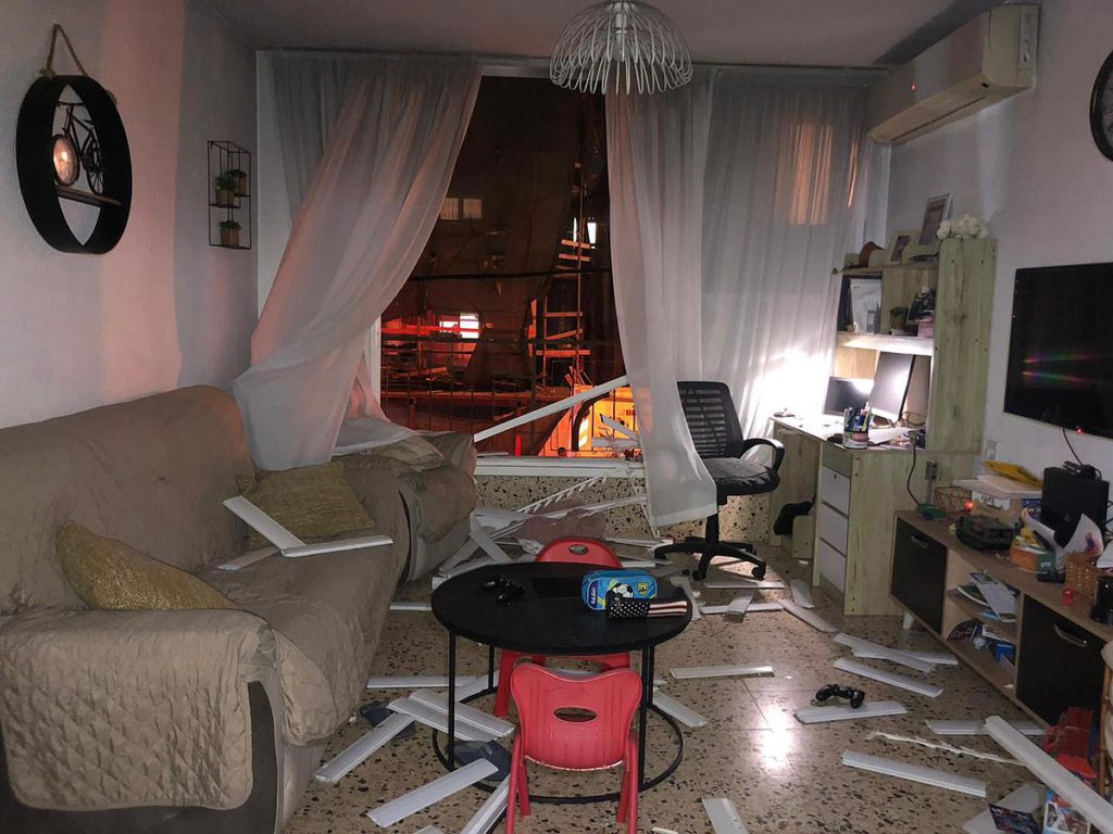 A living room is in shambles after a party